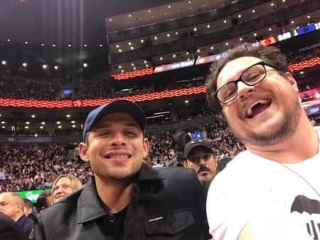 A picture of David Castaneda with his his co-star, Cameron Britton.